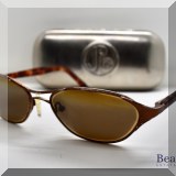 H84. Set of tortoise colored sunglasses. Made in Japan. In a JPG case. Some signs of wear on rim. - $24 